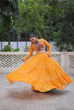 Banjara India Faux Georgette Bandhej Print with Gotta Patti Lace Work  Long Flair Lehenga Set - Mango