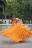 Banjara India Faux Georgette Bandhej Print with Gotta Patti Lace Work  Long Flair Lehenga Set - Mango
