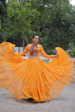 Banjara India Faux Georgette Bandhej Print with Gotta Patti Lace Work  Long Flair Lehenga Set - Mango